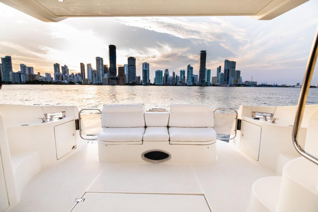 Dining table setup on the aft deck of an Azimut yacht