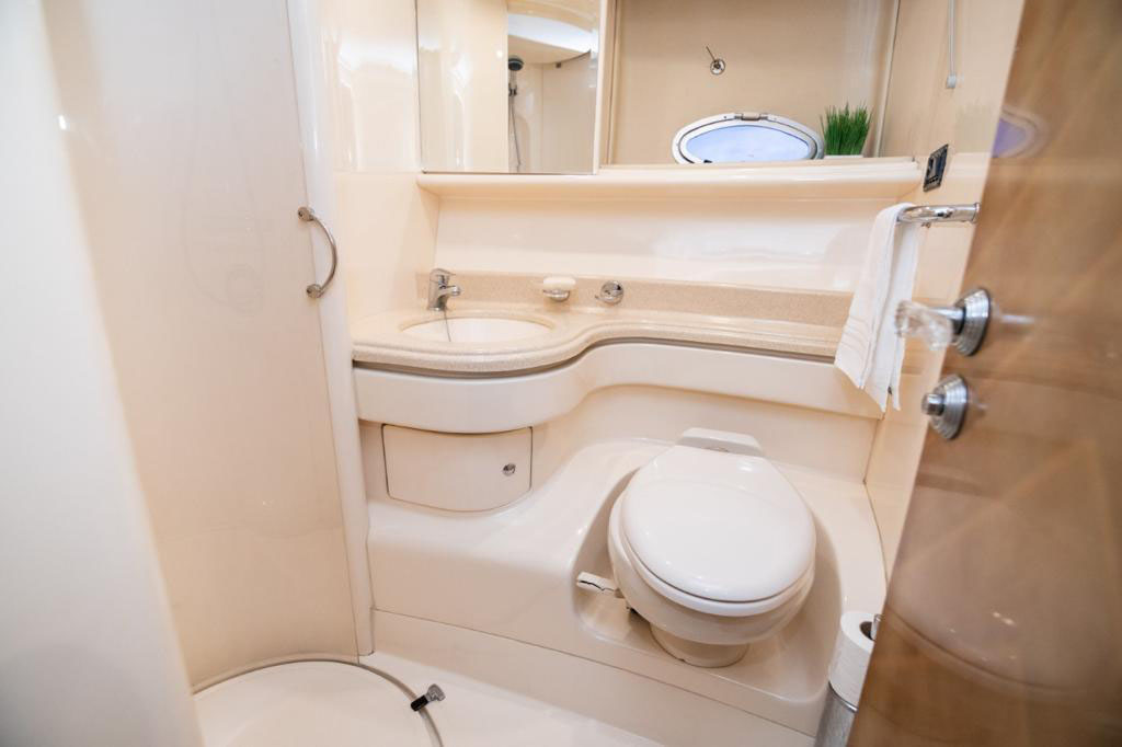 Drone shot of Azimut yacht beside coral reef in Colombia