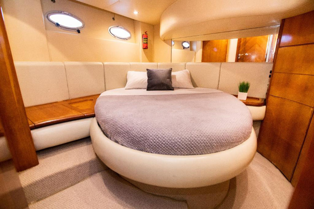 Side view of luxury Azimut yacht passing by the Rosario Islands