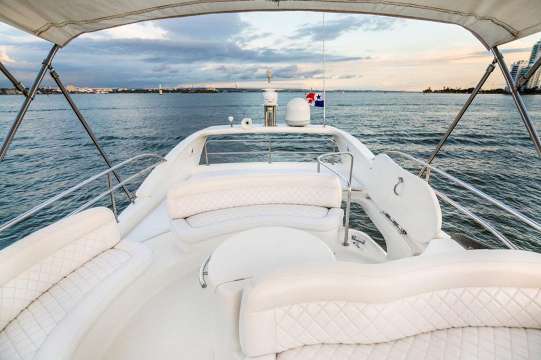 Cockpit view of the captain navigating an Azimut yacht near Cartagena