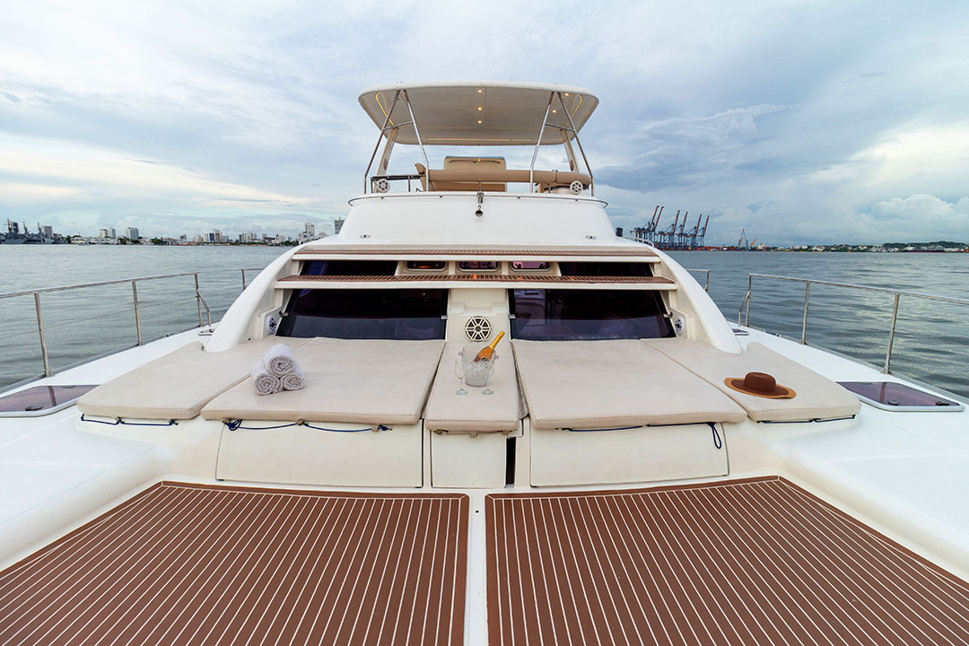 Guests relaxing on the trampoline netting at the bow