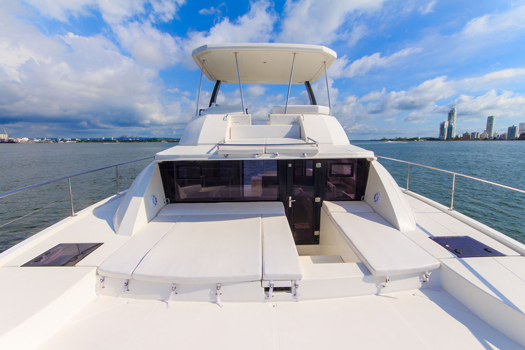 Family relaxing in the main salon of the air-conditioned Oddy Sea