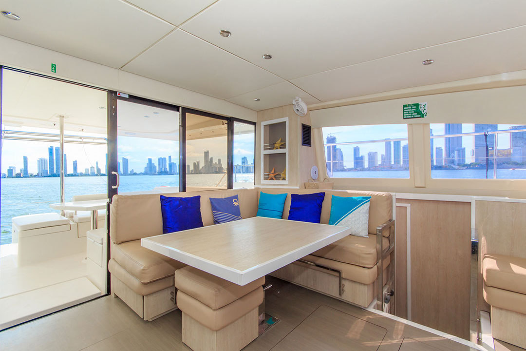 Guests enjoying the shaded seating area on Oddy Sea's stern