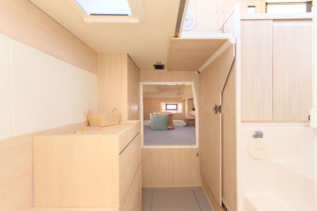 Captain navigating Oddy Sea catamaran from the helm