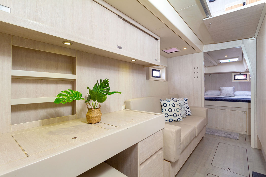 Lounge area of catamaran with Caribbean Sea in background
