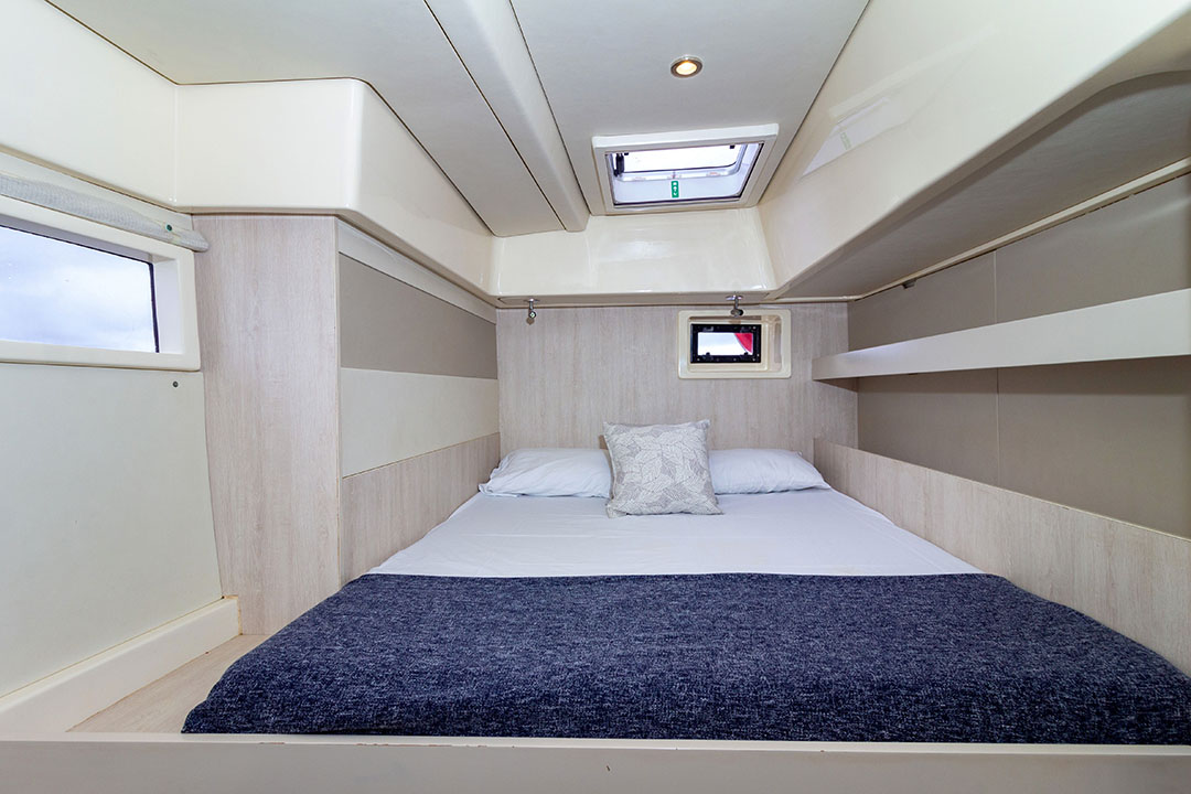 Catamaran with paddleboards and snorkeling gear onboard