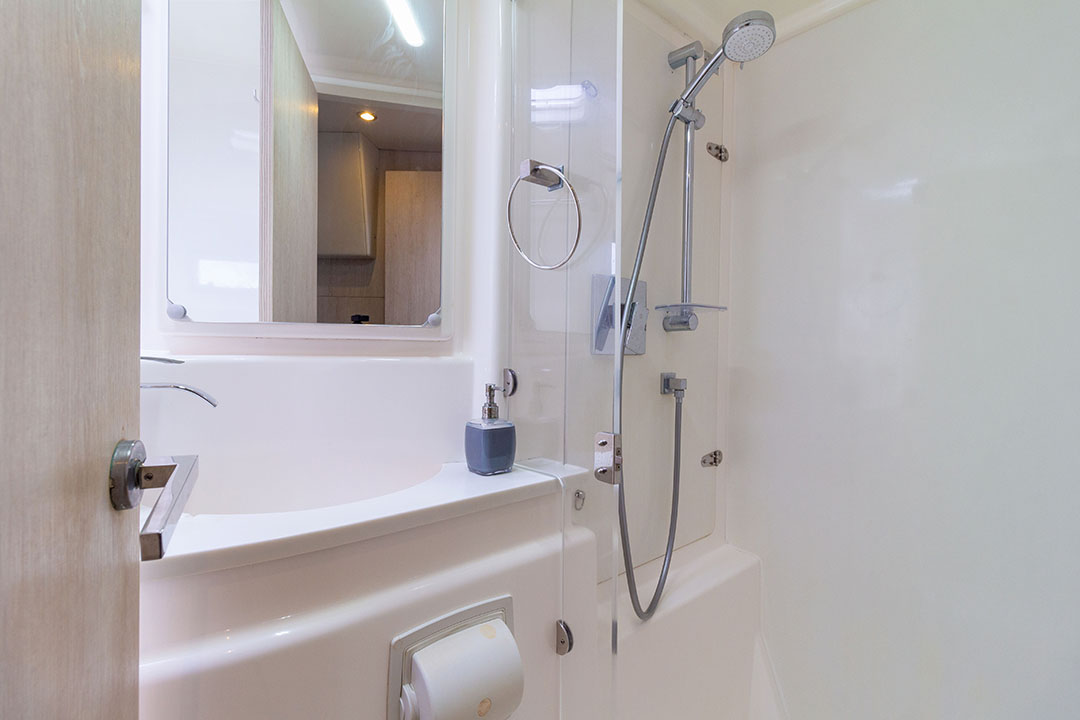 Colombian coastline behind a moored 51-ft catamaran