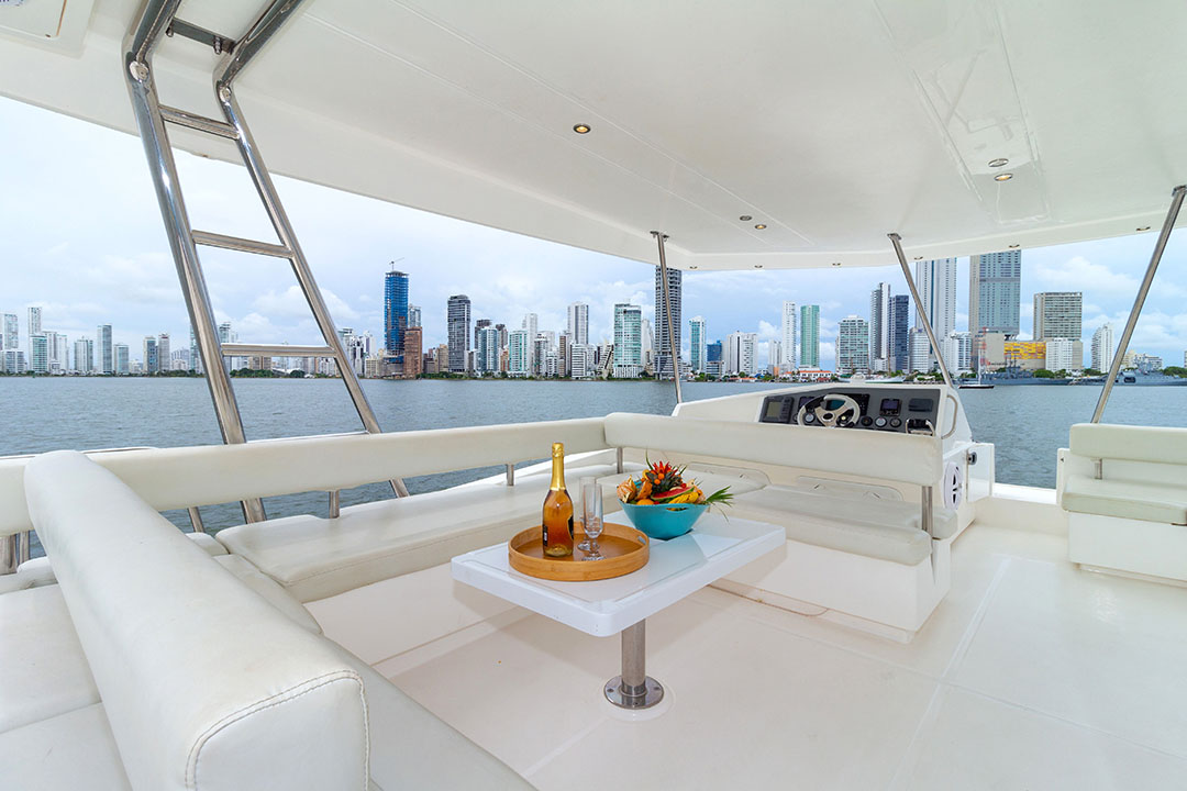 A couple toasting champagne on the catamaran in Cartagena