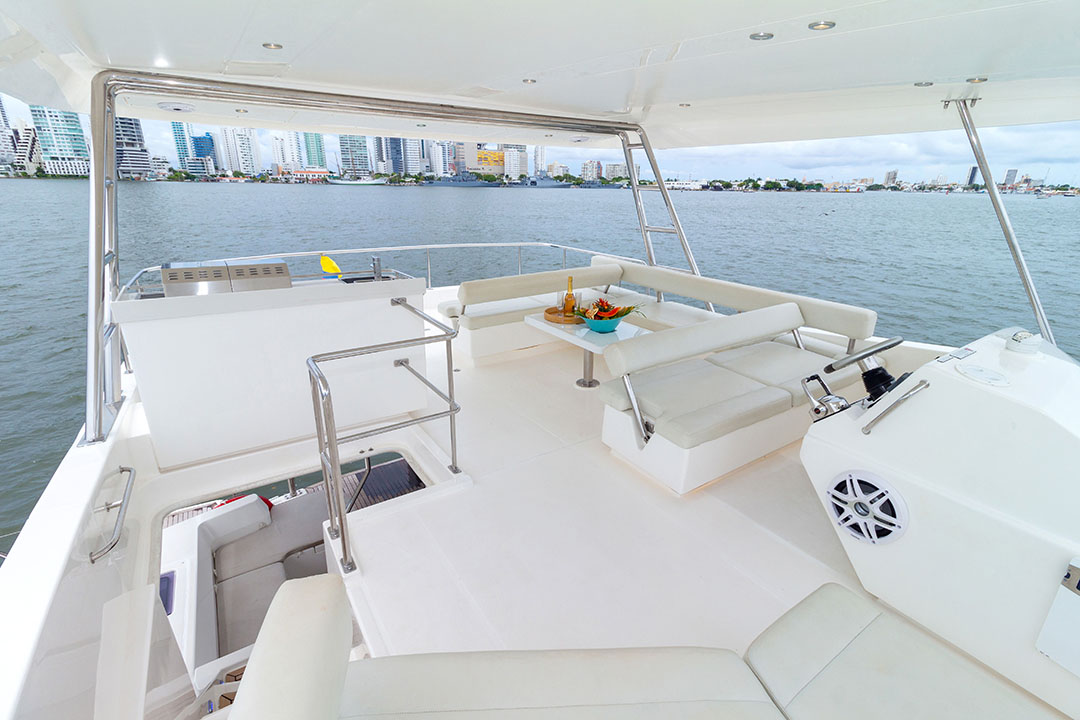 Tourists enjoying drinks aboard a luxury catamaran in Colombia