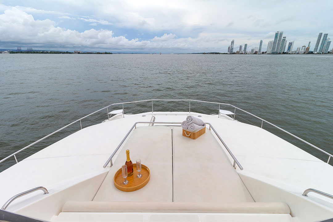 Bow of 51-ft catamaran cutting through Caribbean waves