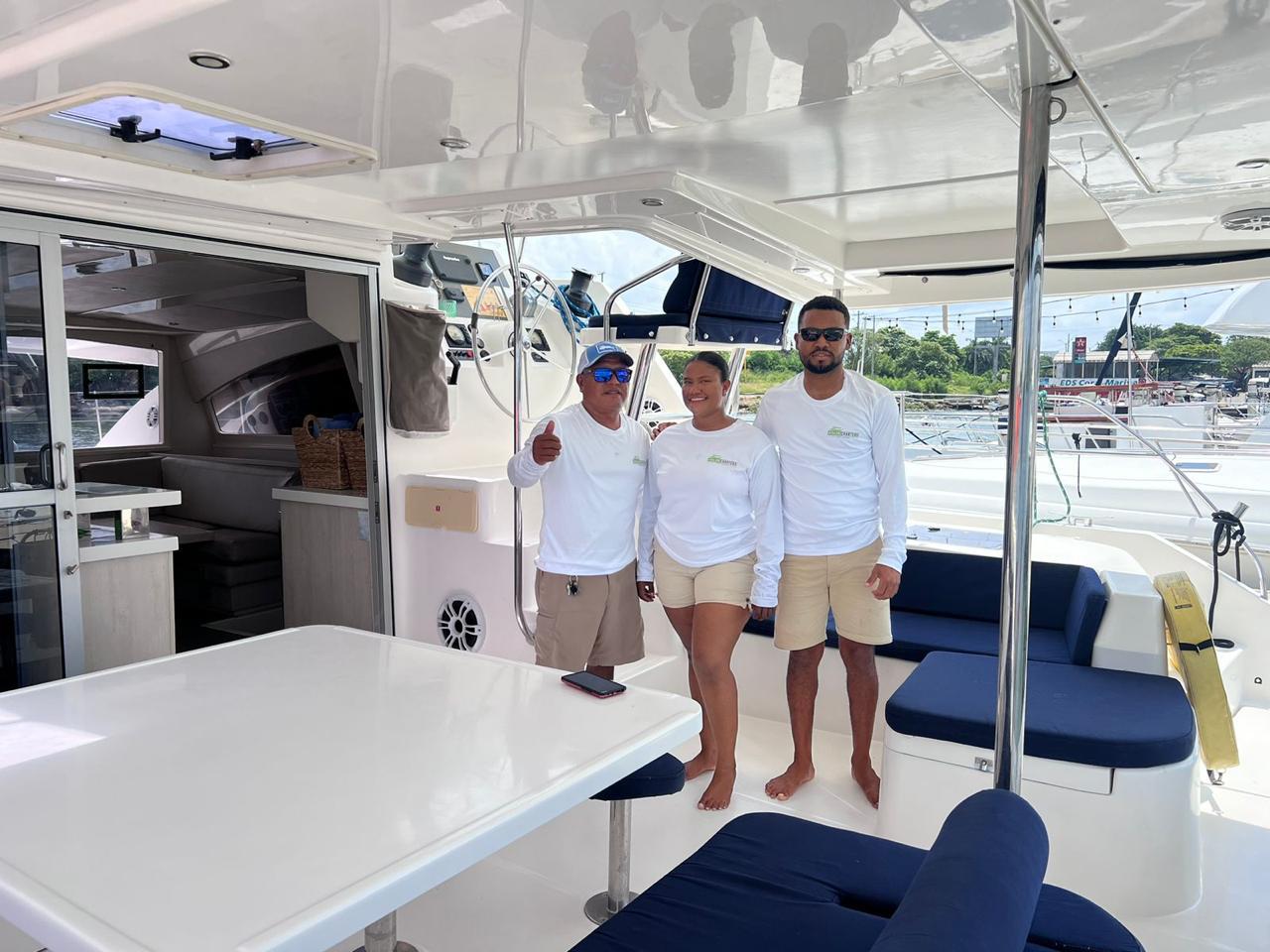 Captain steering Avalon from the flybridge helm