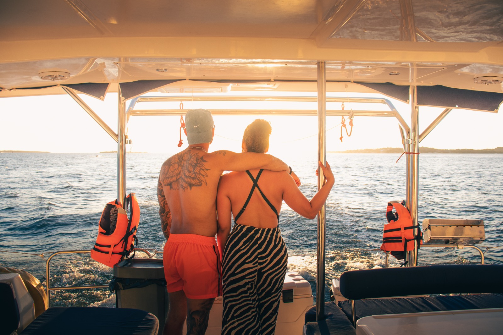 Sunset over the ocean with Avalon catamaran in view