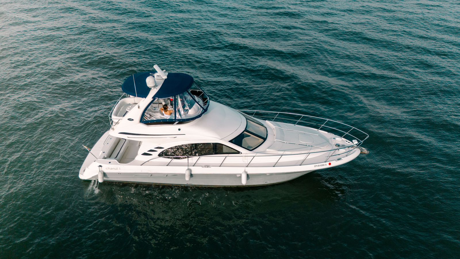 Chanul yacht tied to a private dock near Barú
