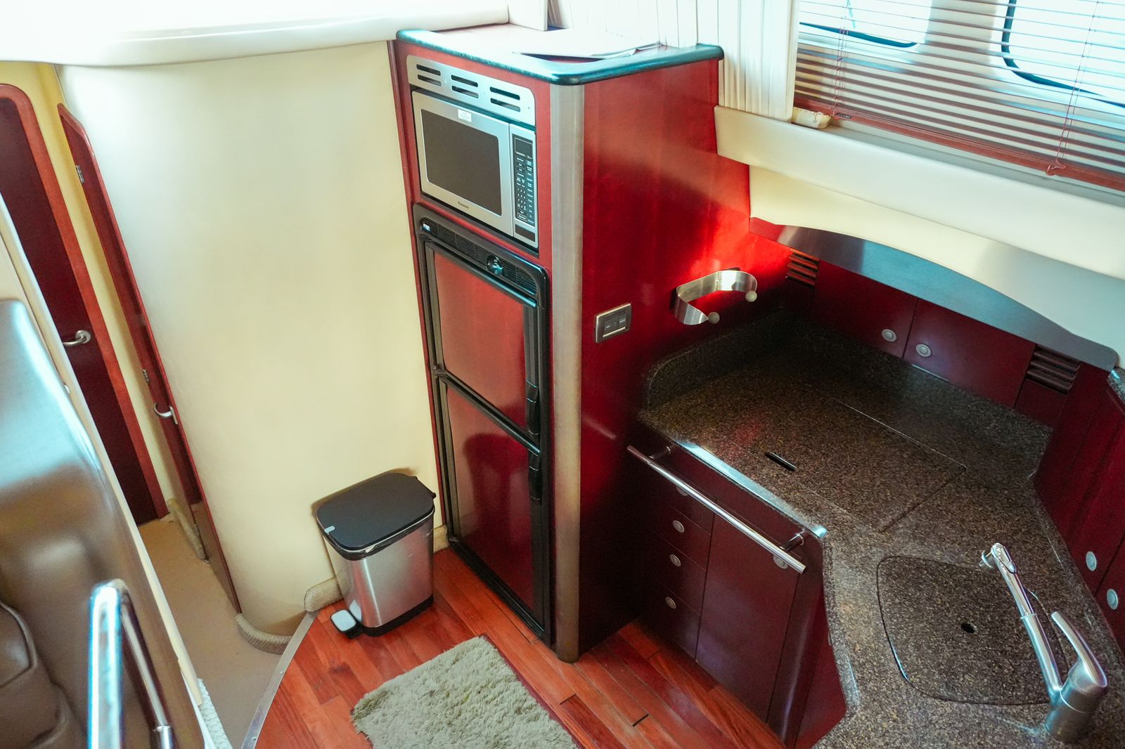 Chanul yacht anchored near the Rosario Islands with guests swimming nearby