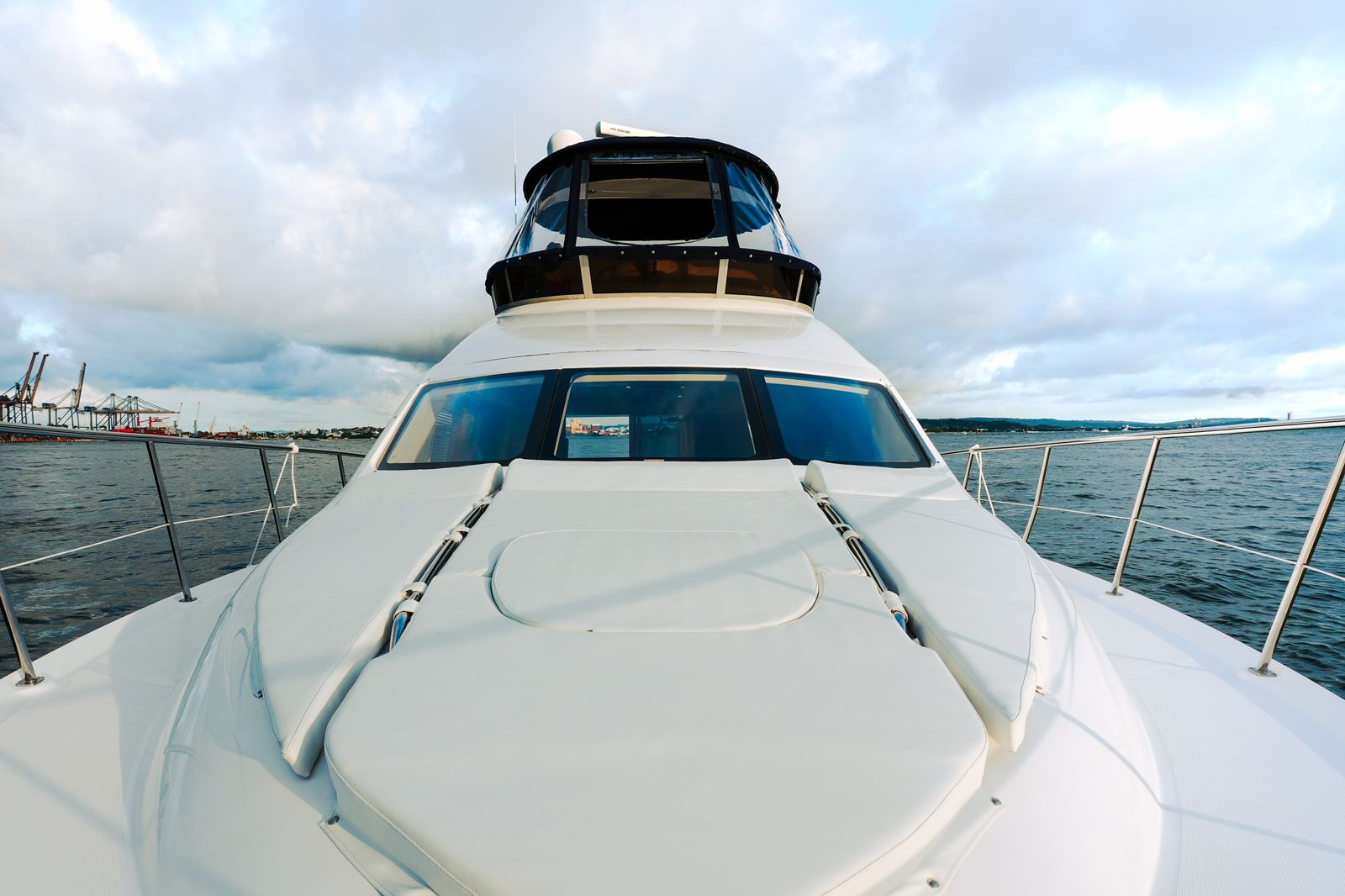 Guests relaxing on the sun deck of Chanul yacht