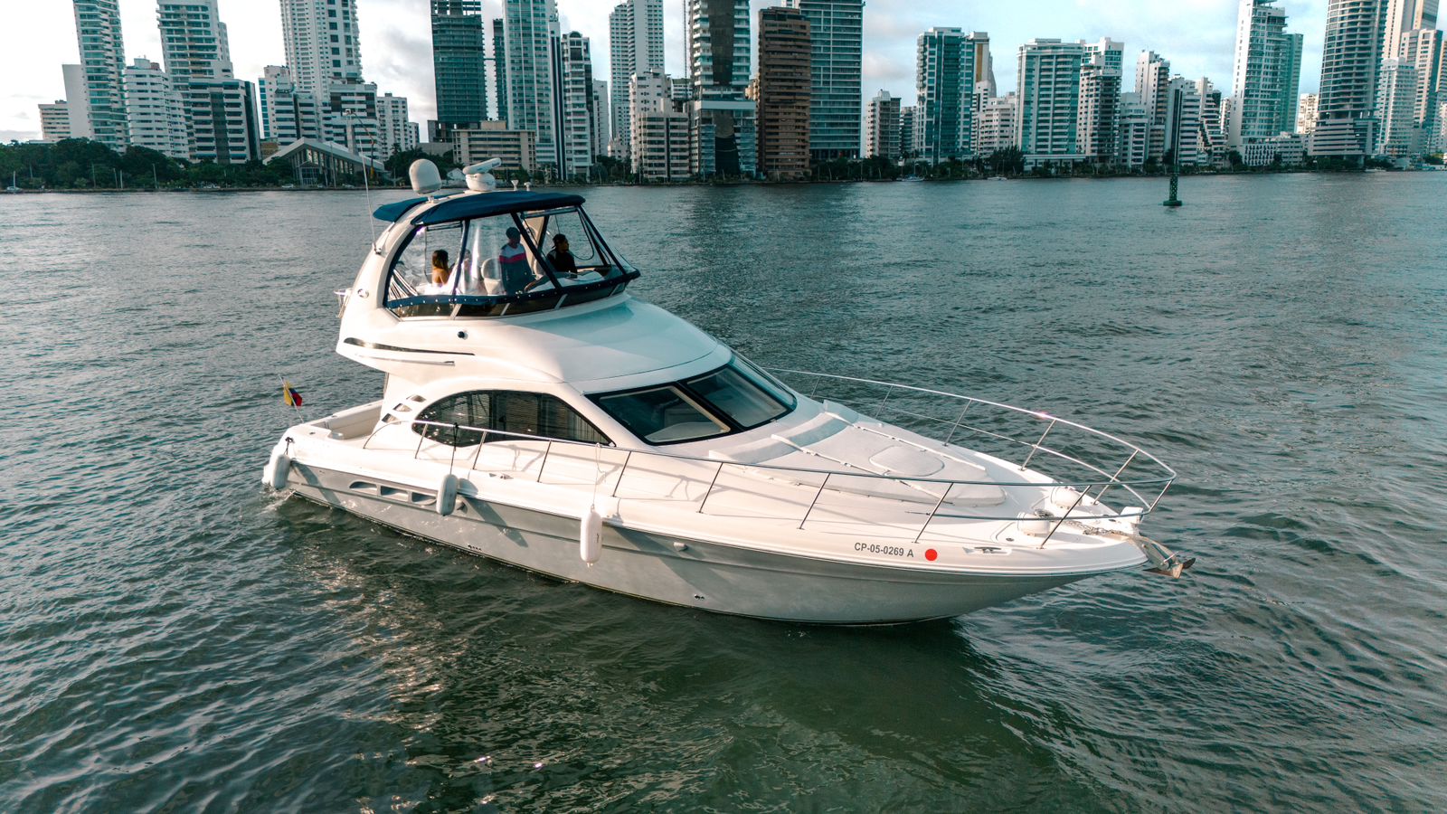 Aerial shot of Chanul yacht anchored near a tropical island