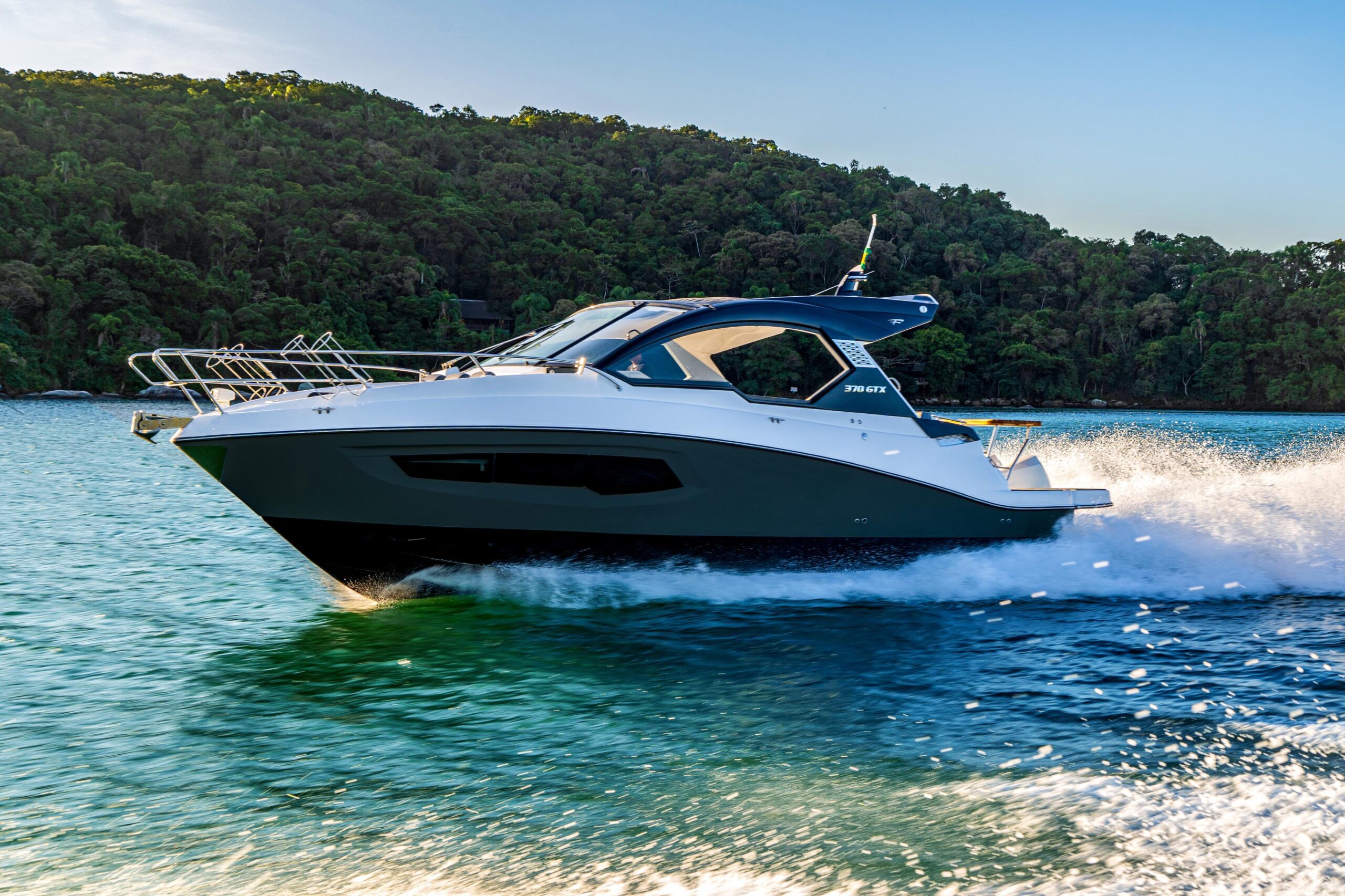 Private yacht rental in Cartagena with city skyline views.