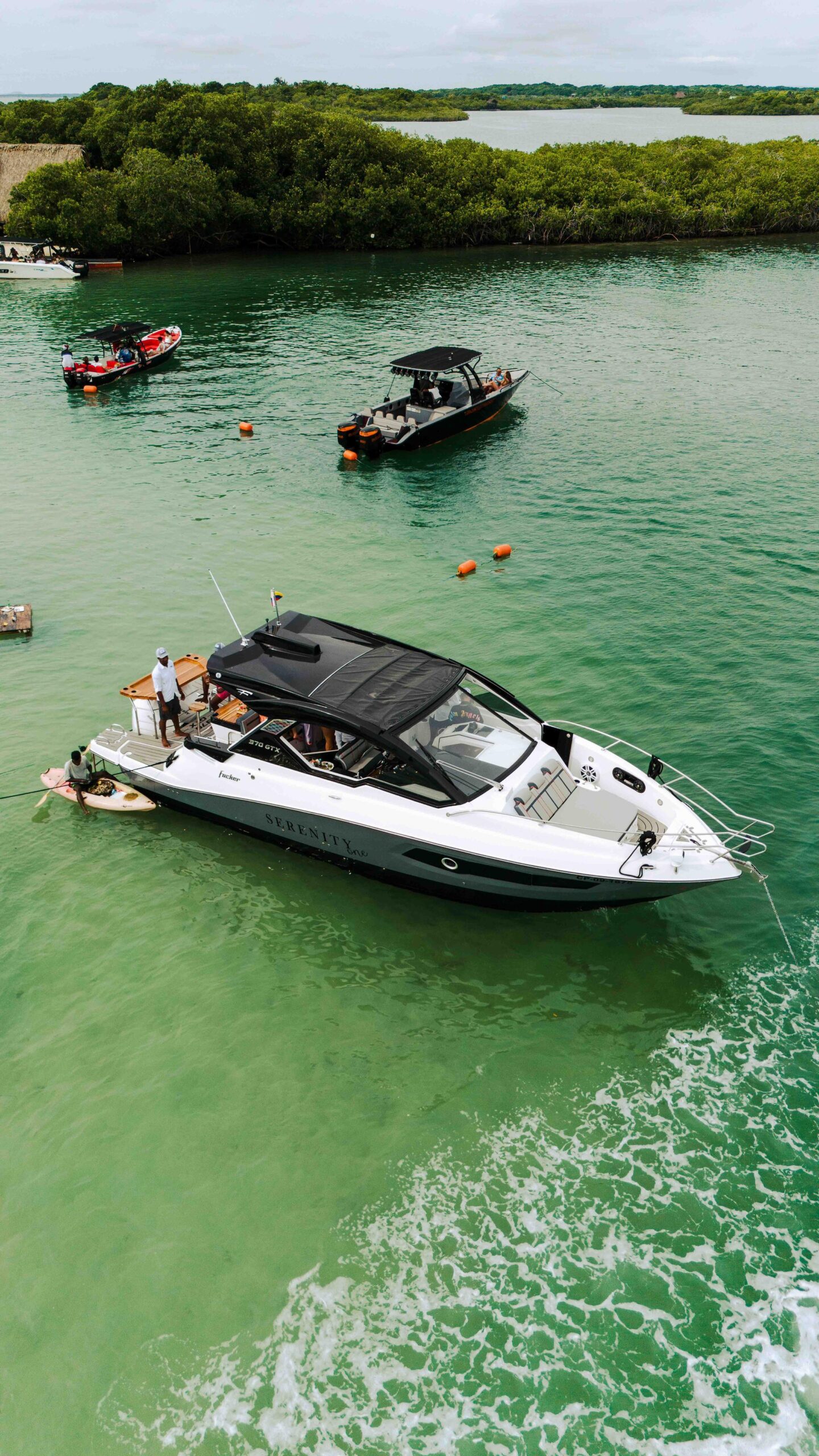 Stylish yacht cruising past Cartagena’s historic fort.