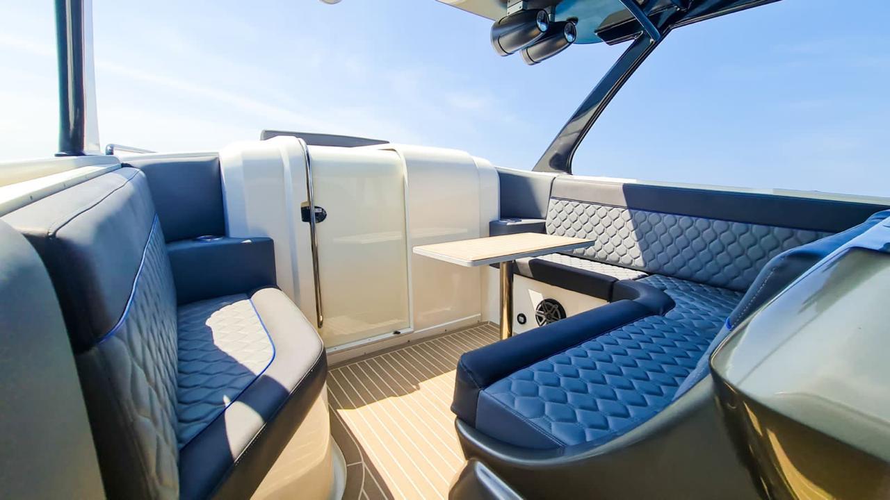 Shiny four-motor yacht prepared for charter in Cartagena.