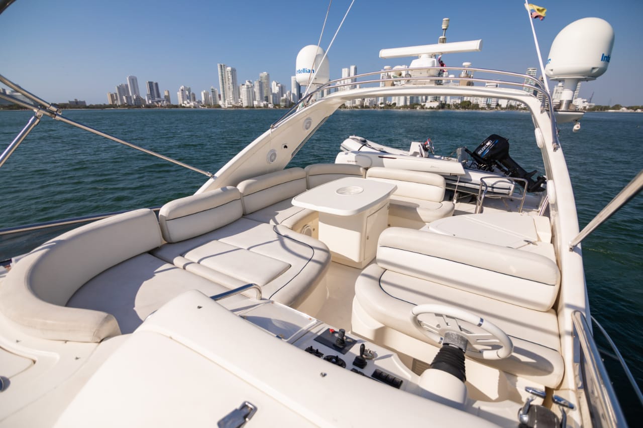 Guests relaxing on the deck of My Toy yacht in Cartagena waters